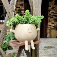 Maceta Carita Feliz con sillita o columpio - Decoración de resina